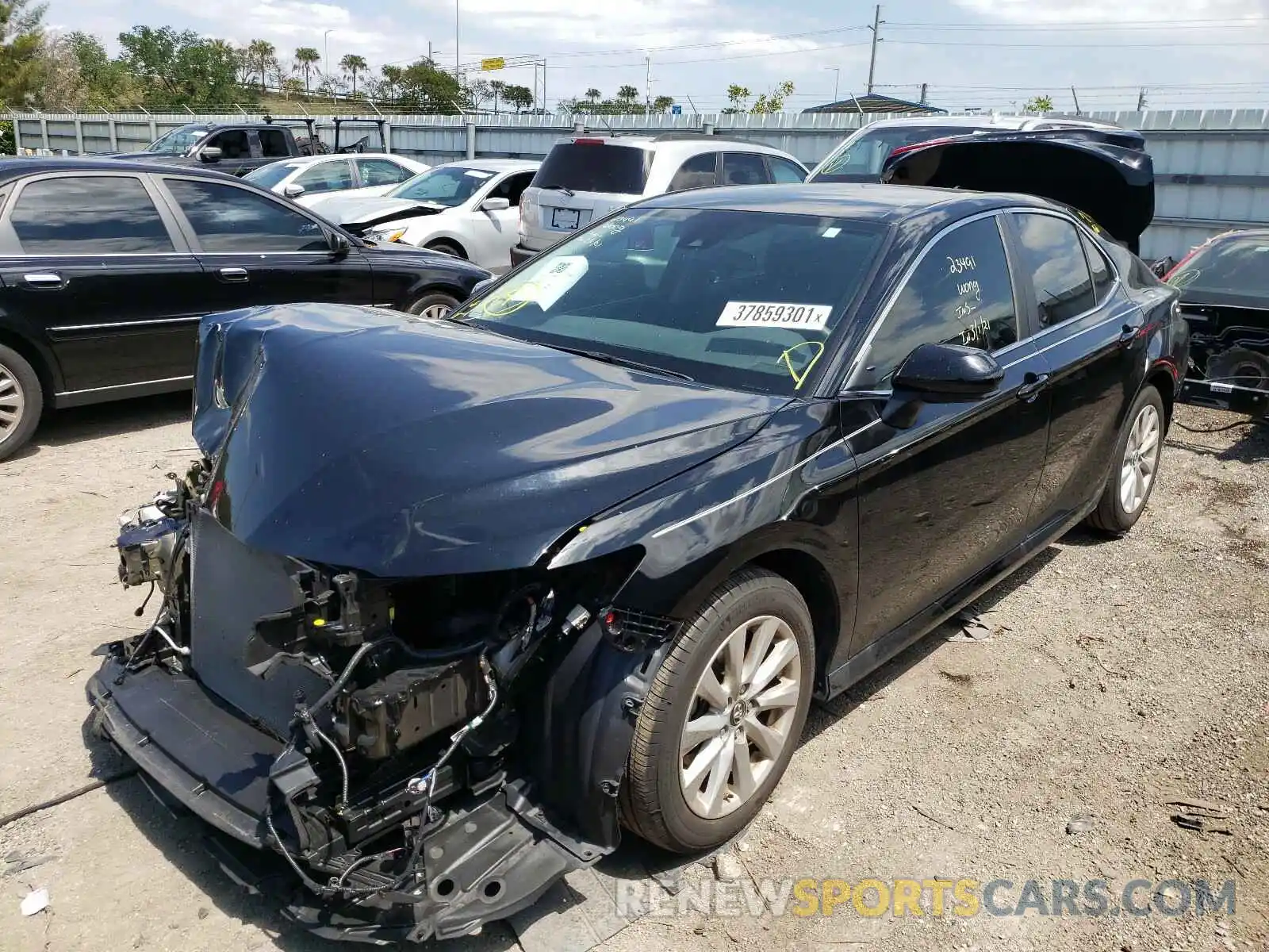 2 Photograph of a damaged car 4T1B11HK1KU683318 TOYOTA CAMRY 2019