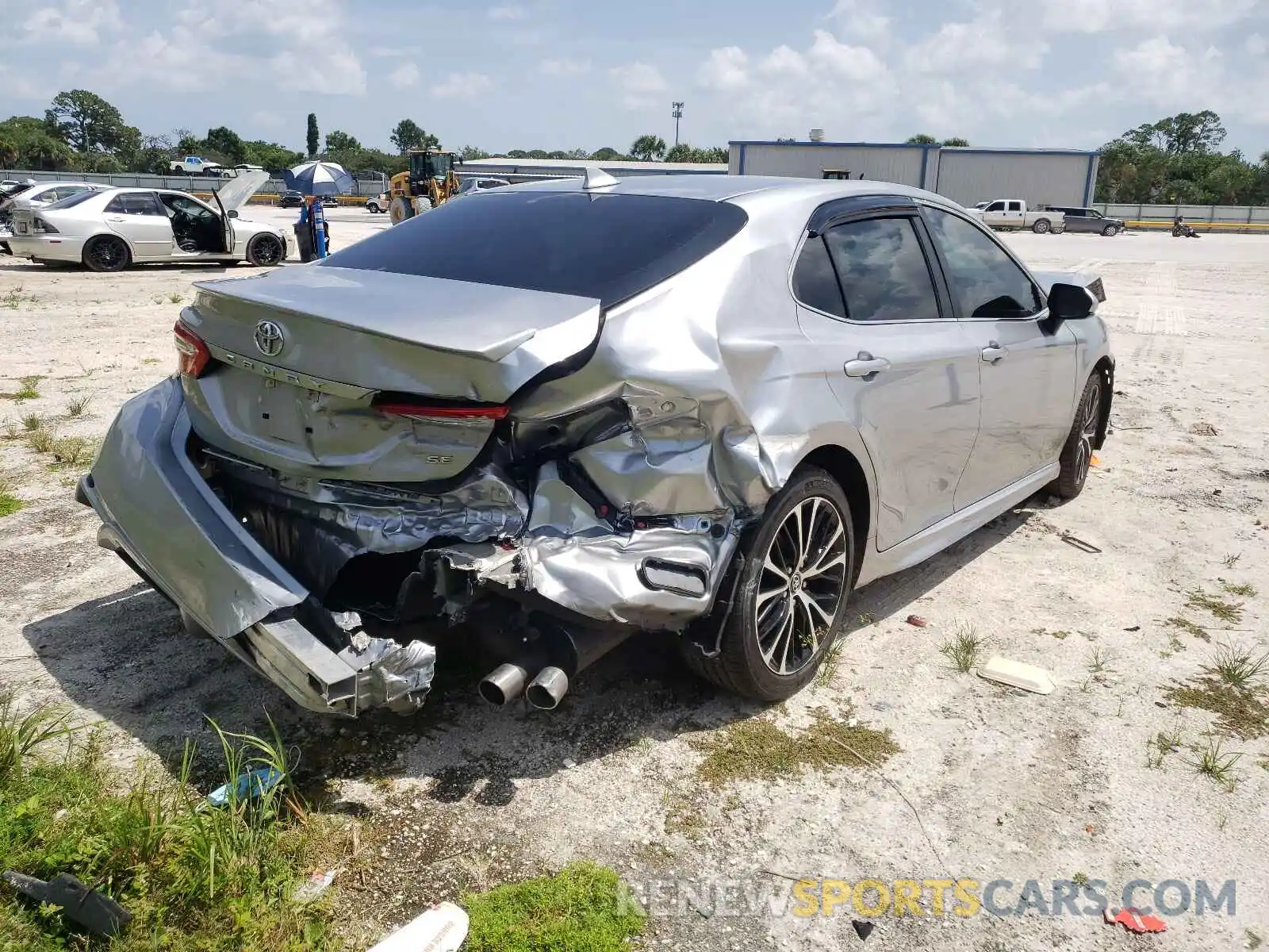 4 Photograph of a damaged car 4T1B11HK1KU691239 TOYOTA CAMRY 2019