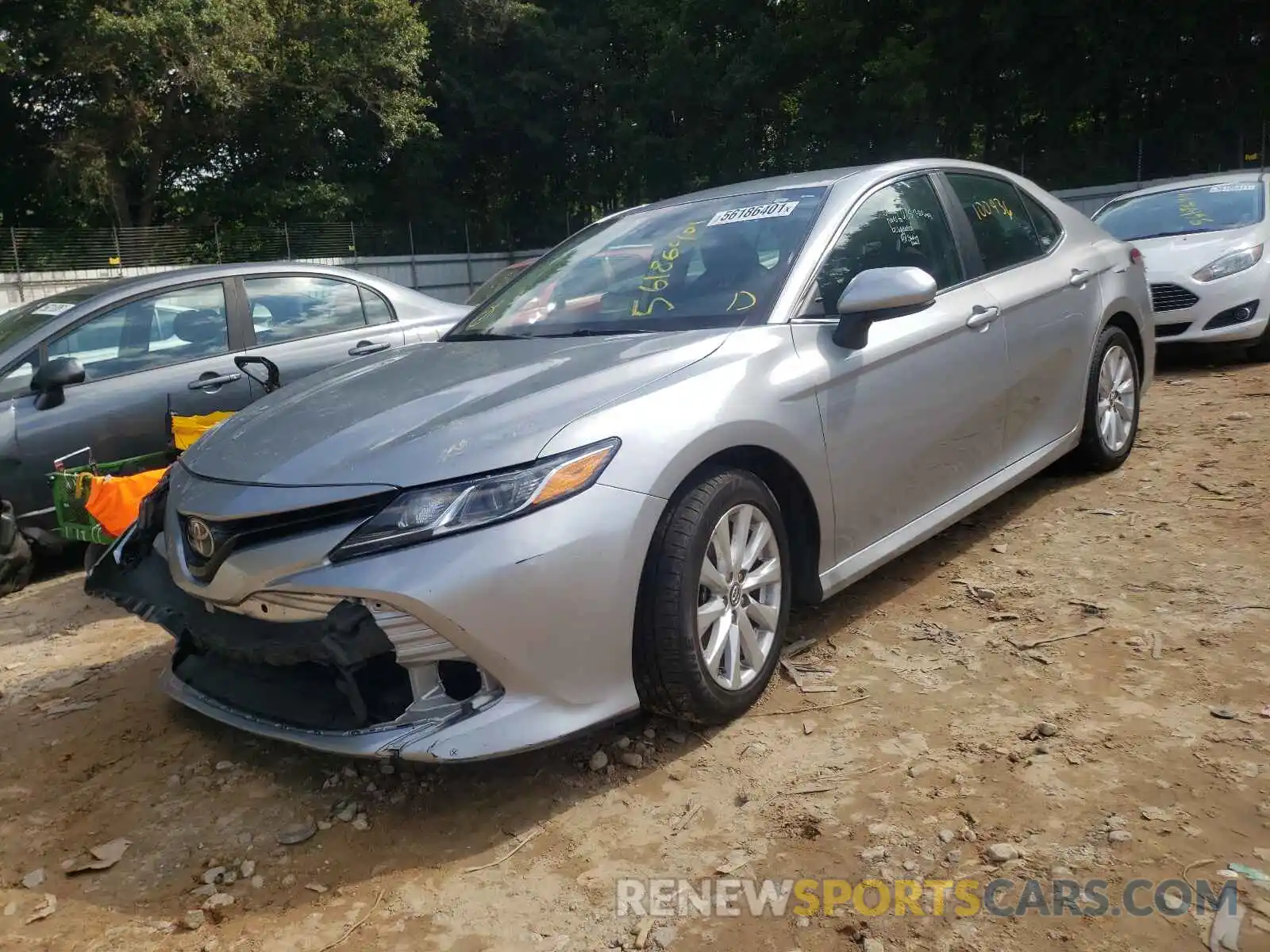 2 Photograph of a damaged car 4T1B11HK1KU691905 TOYOTA CAMRY 2019