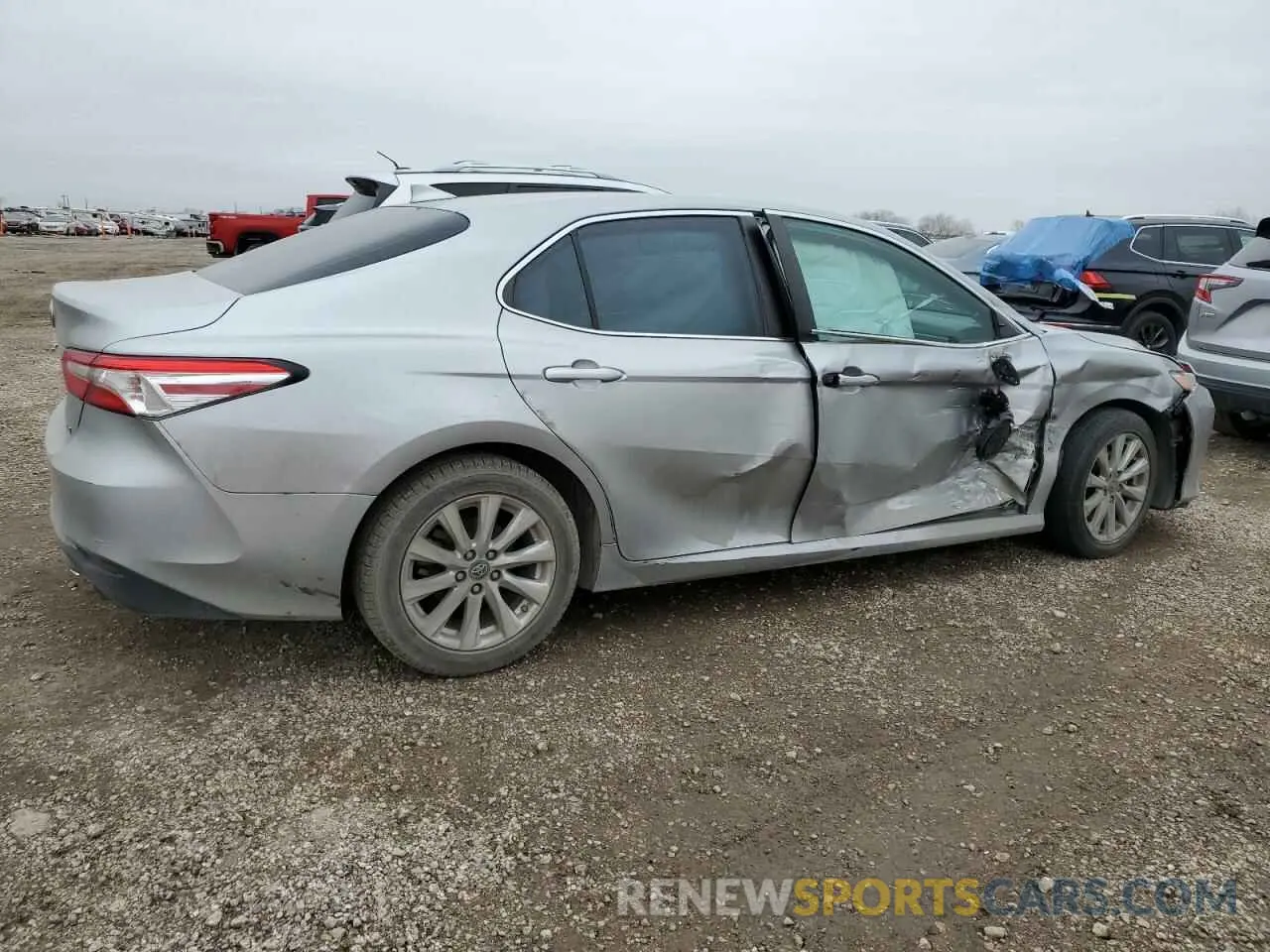3 Photograph of a damaged car 4T1B11HK1KU692911 TOYOTA CAMRY 2019