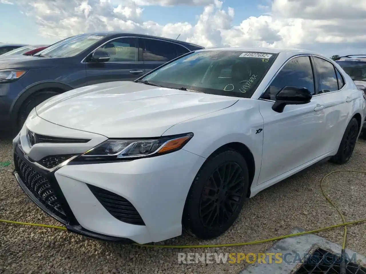 2 Photograph of a damaged car 4T1B11HK1KU696215 TOYOTA CAMRY 2019