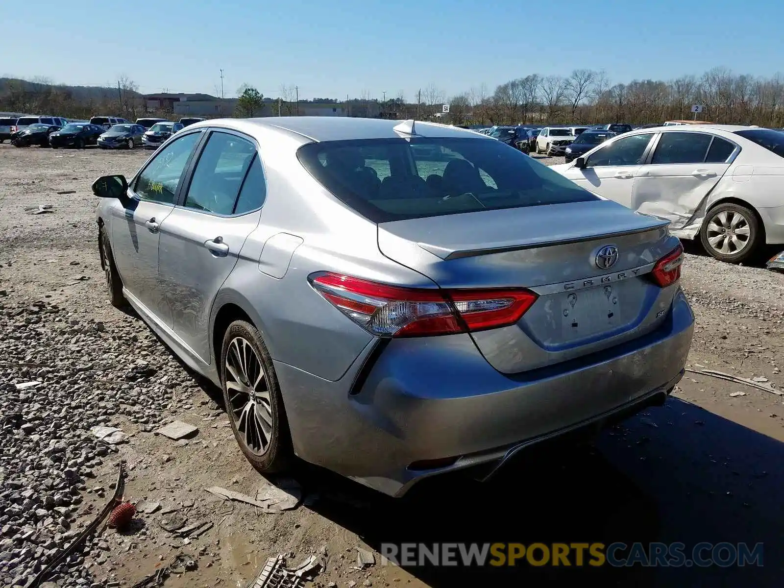 3 Photograph of a damaged car 4T1B11HK1KU697705 TOYOTA CAMRY 2019