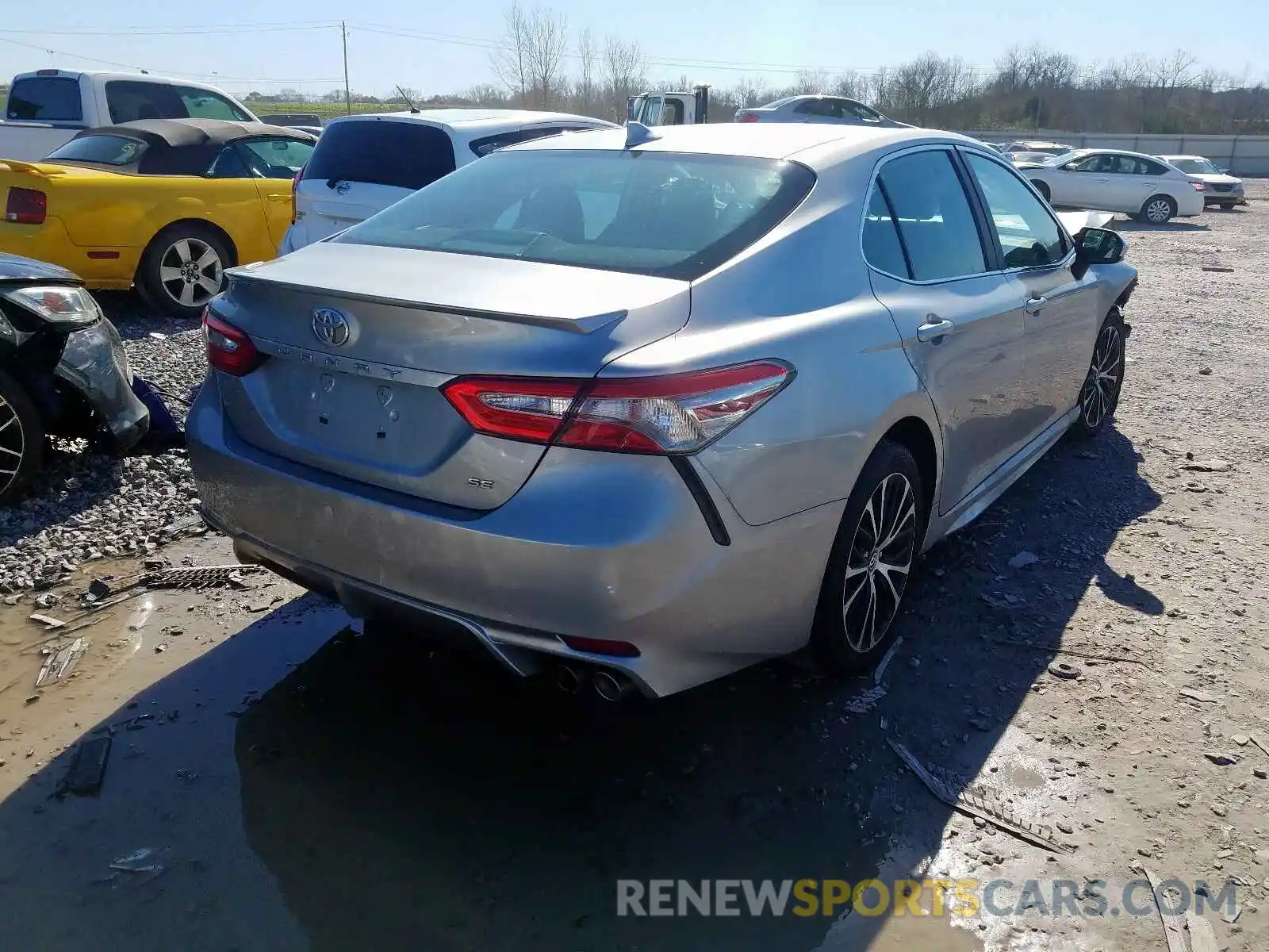 4 Photograph of a damaged car 4T1B11HK1KU697705 TOYOTA CAMRY 2019