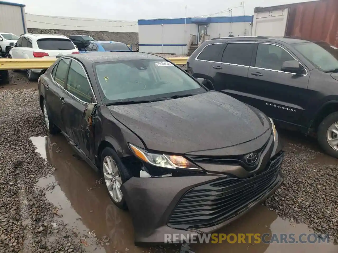 4 Photograph of a damaged car 4T1B11HK1KU698059 TOYOTA CAMRY 2019