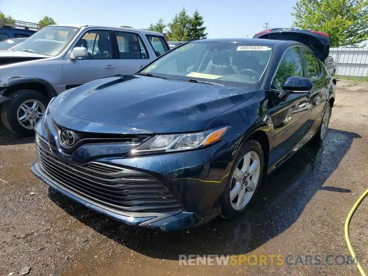 2 Photograph of a damaged car 4T1B11HK1KU705429 TOYOTA CAMRY 2019