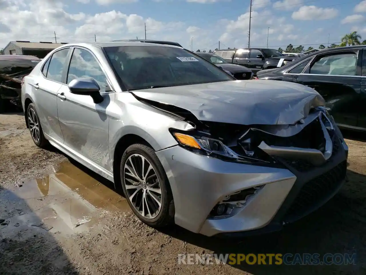 4 Photograph of a damaged car 4T1B11HK1KU709920 TOYOTA CAMRY 2019