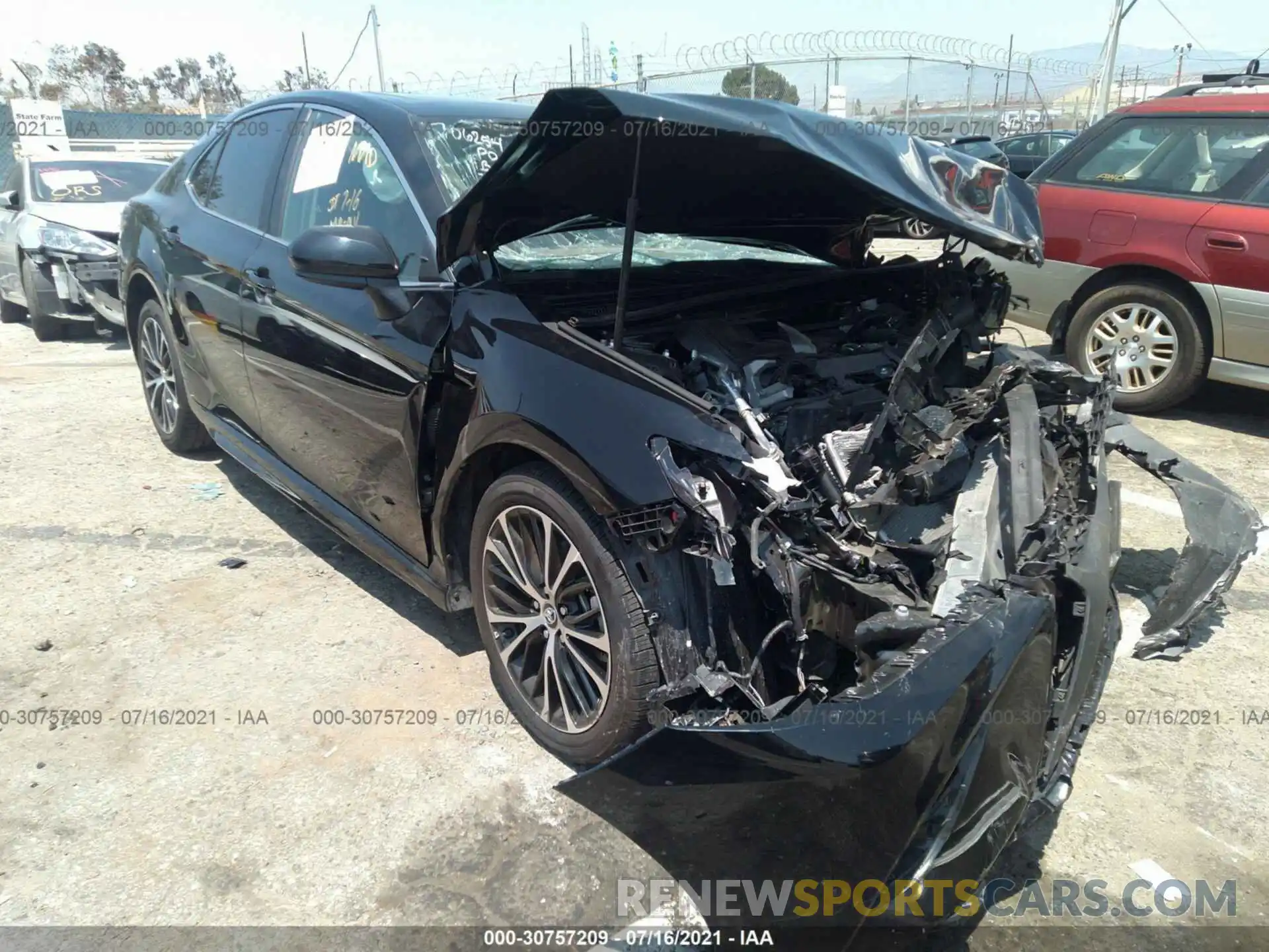 1 Photograph of a damaged car 4T1B11HK1KU710680 TOYOTA CAMRY 2019