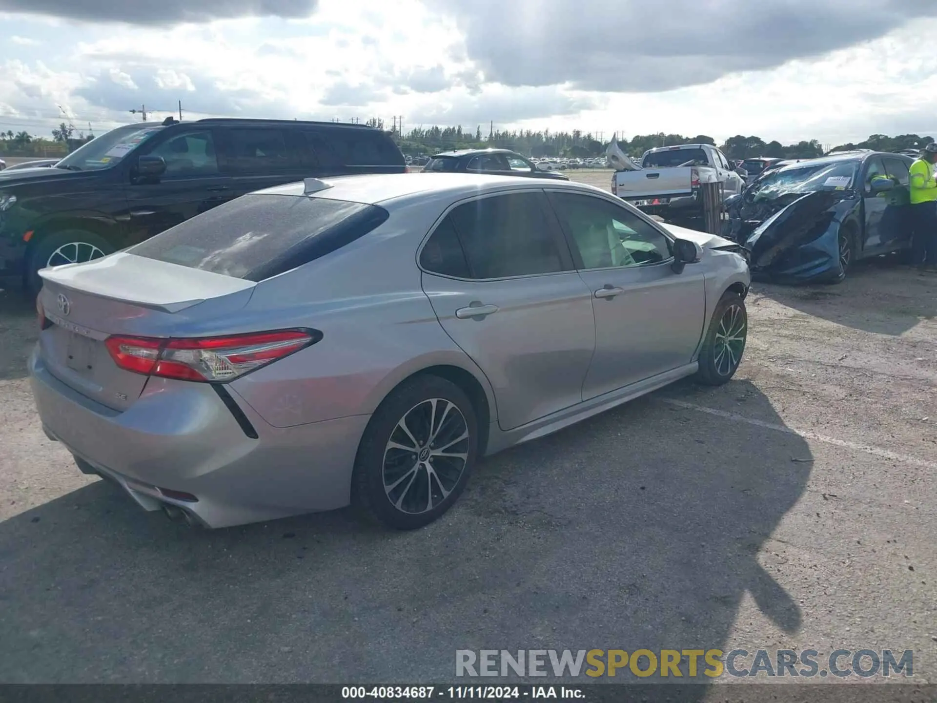 4 Photograph of a damaged car 4T1B11HK1KU713160 TOYOTA CAMRY 2019