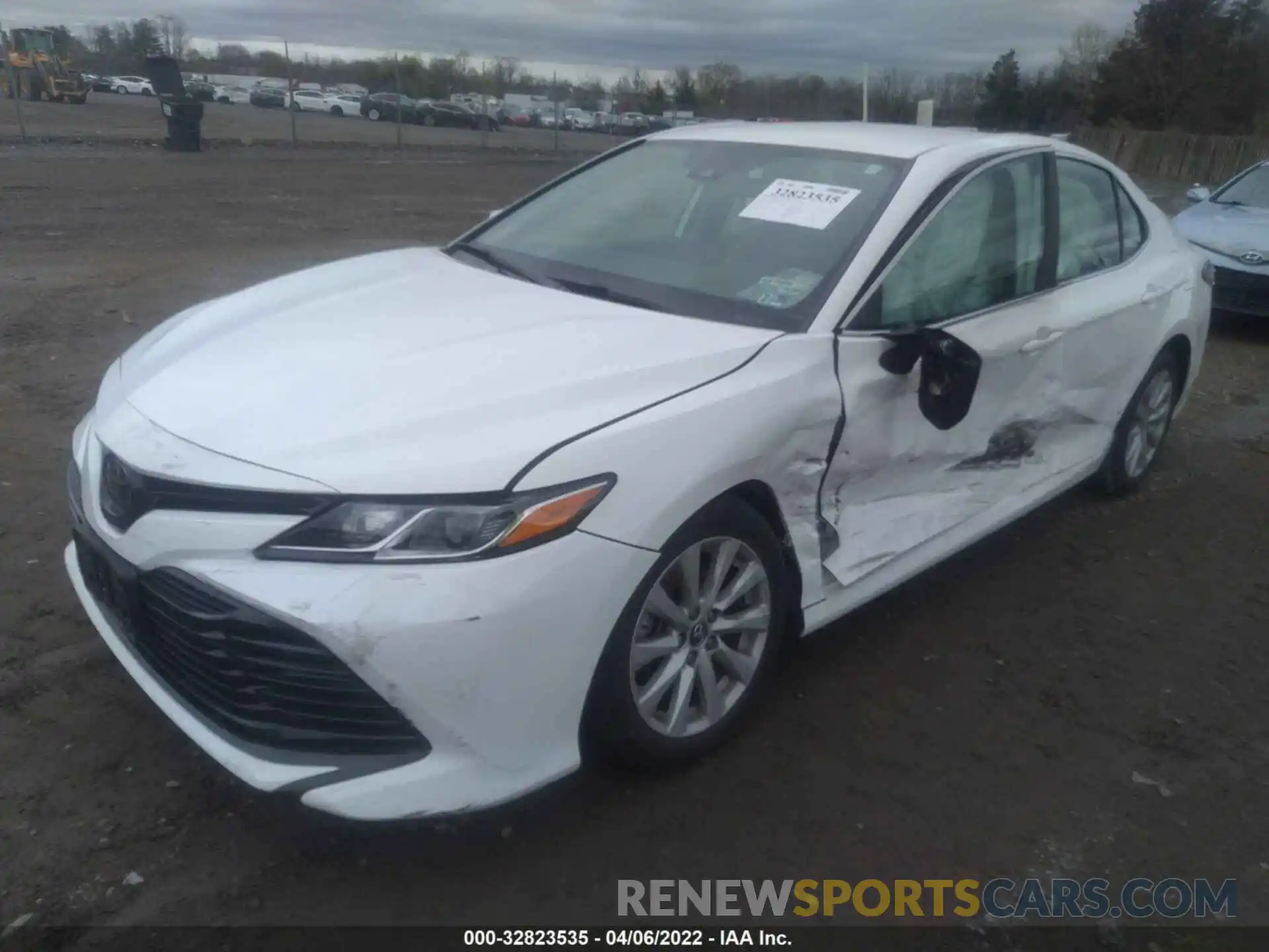 2 Photograph of a damaged car 4T1B11HK1KU714695 TOYOTA CAMRY 2019