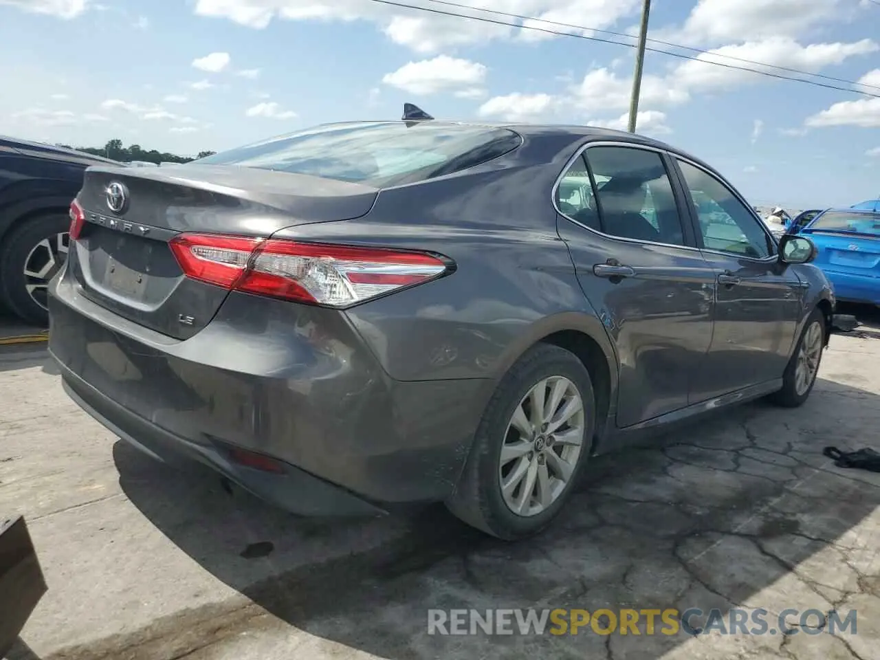 3 Photograph of a damaged car 4T1B11HK1KU714857 TOYOTA CAMRY 2019