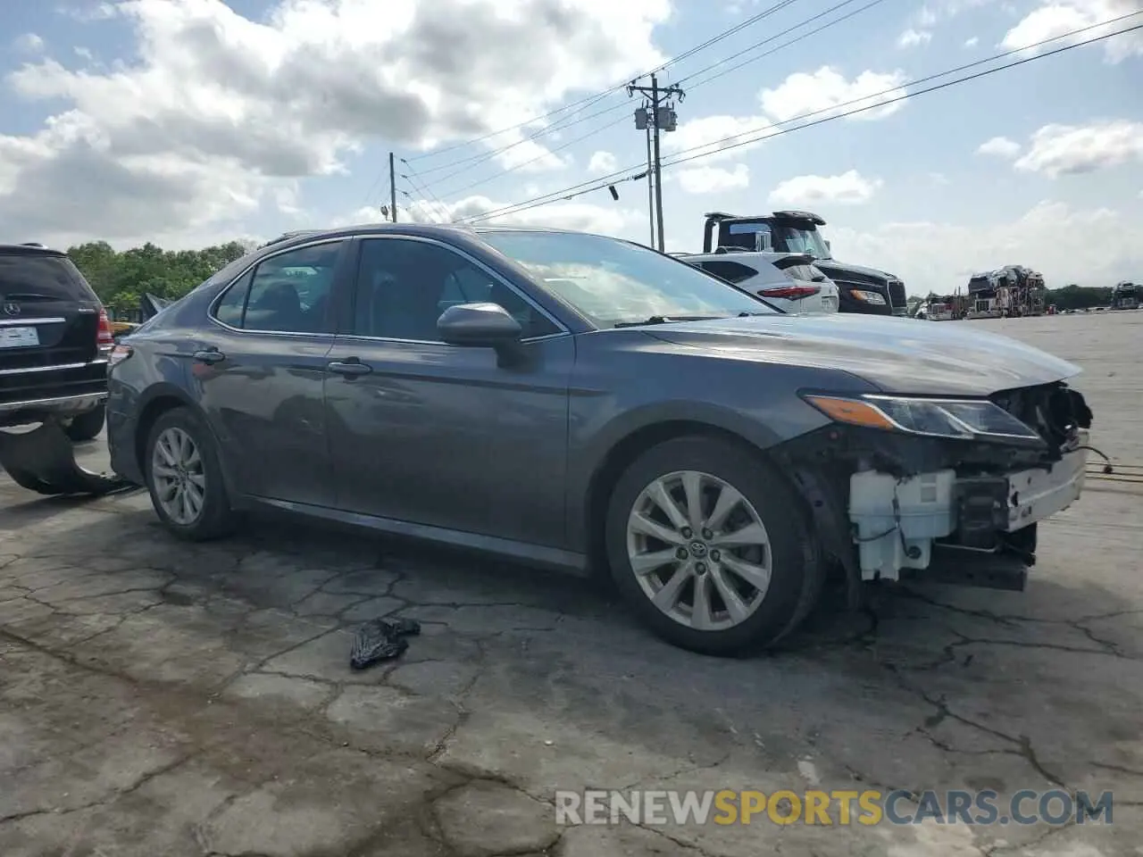 4 Photograph of a damaged car 4T1B11HK1KU714857 TOYOTA CAMRY 2019