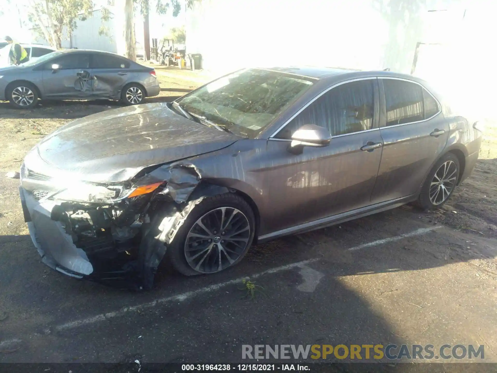 2 Photograph of a damaged car 4T1B11HK1KU715913 TOYOTA CAMRY 2019