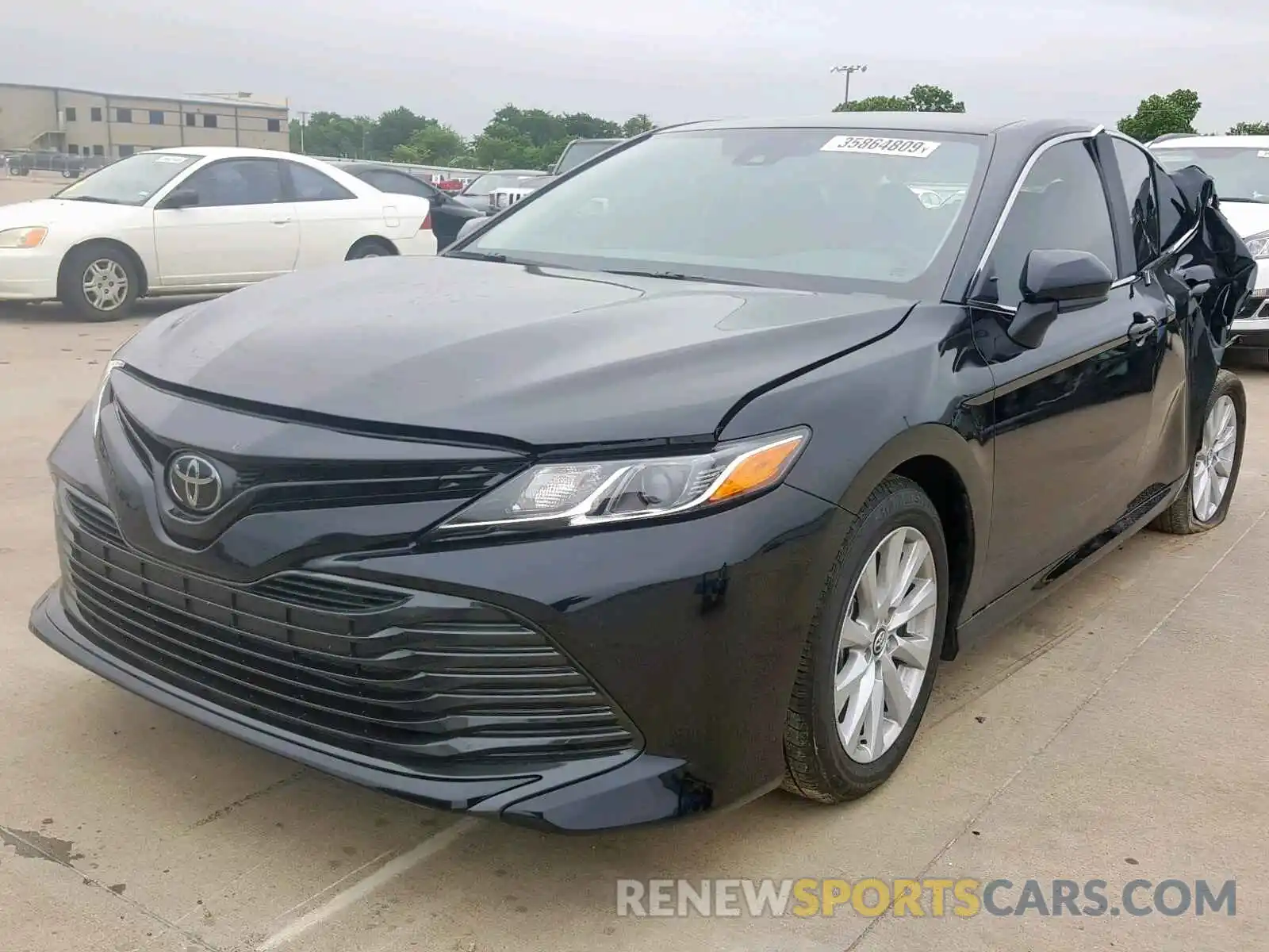 2 Photograph of a damaged car 4T1B11HK1KU717080 TOYOTA CAMRY 2019