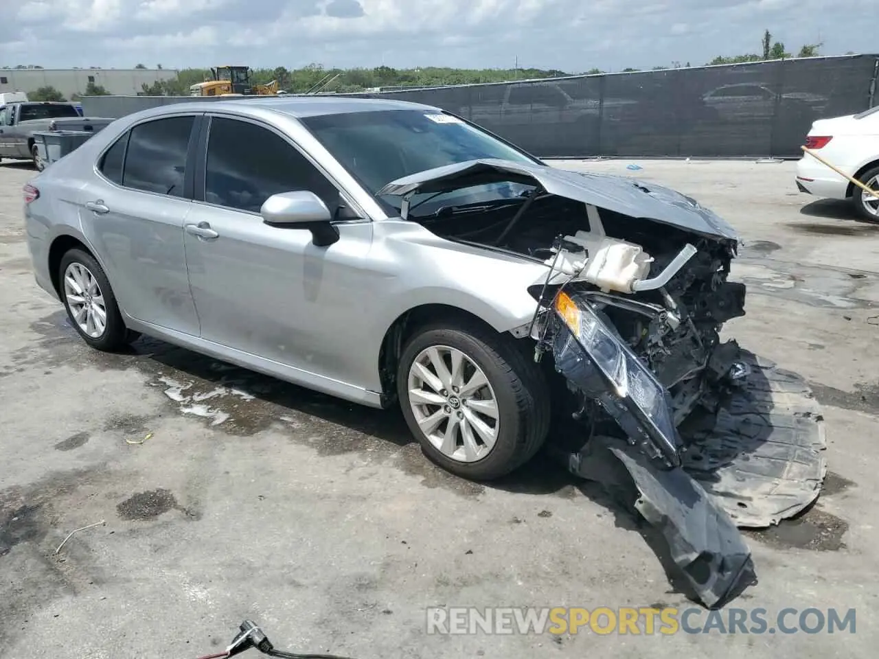 4 Photograph of a damaged car 4T1B11HK1KU718150 TOYOTA CAMRY 2019