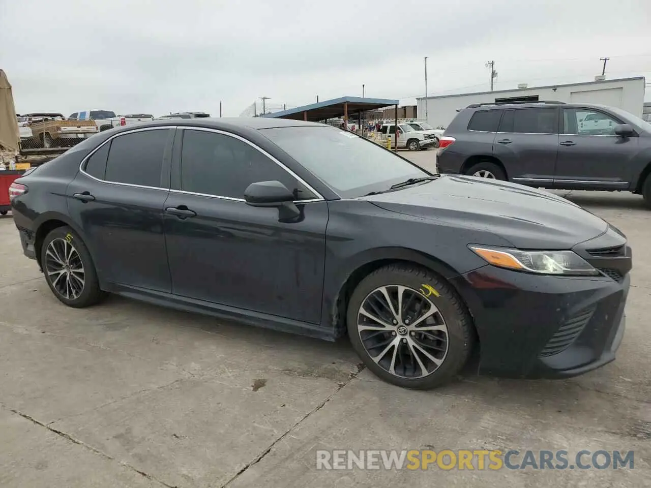 4 Photograph of a damaged car 4T1B11HK1KU723607 TOYOTA CAMRY 2019