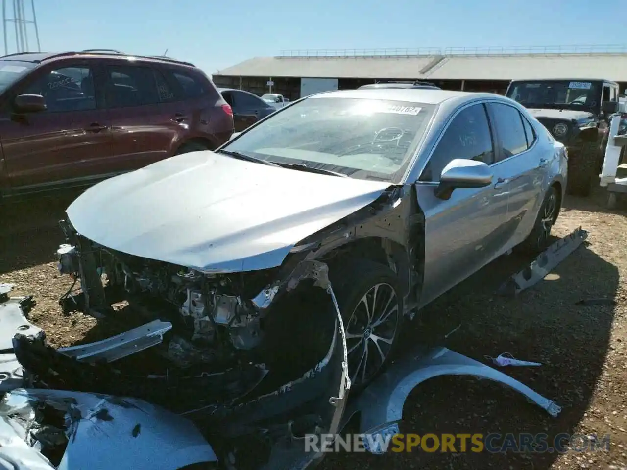 2 Photograph of a damaged car 4T1B11HK1KU725776 TOYOTA CAMRY 2019