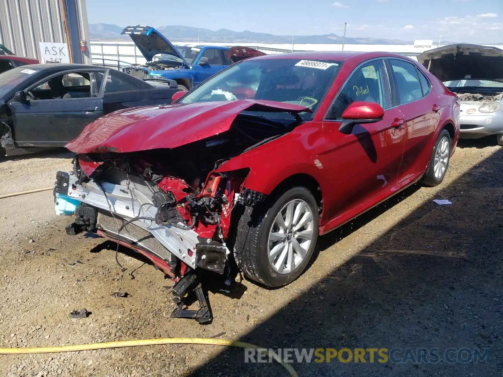 2 Photograph of a damaged car 4T1B11HK1KU726152 TOYOTA CAMRY 2019