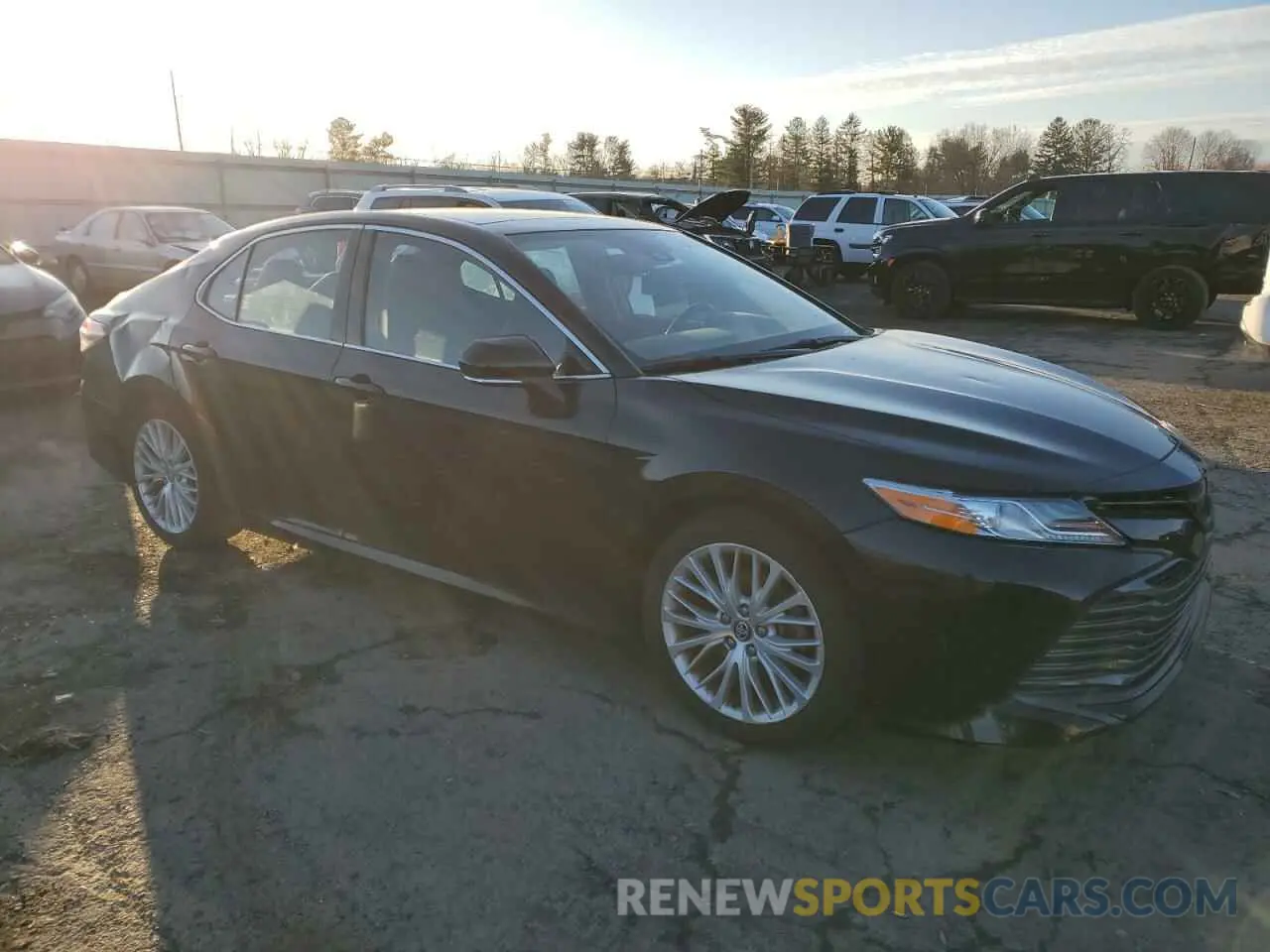 4 Photograph of a damaged car 4T1B11HK1KU728774 TOYOTA CAMRY 2019