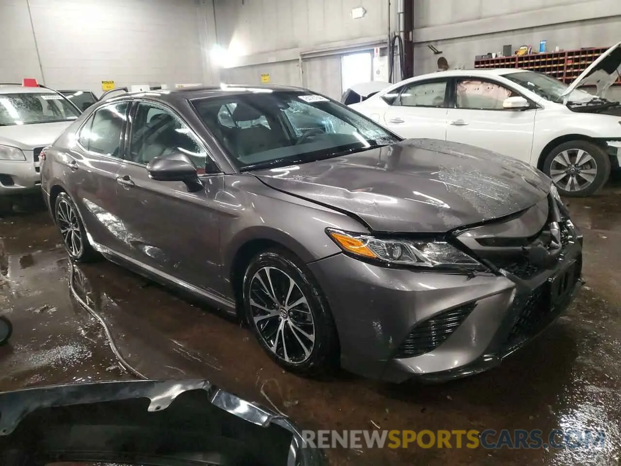 4 Photograph of a damaged car 4T1B11HK1KU733313 TOYOTA CAMRY 2019