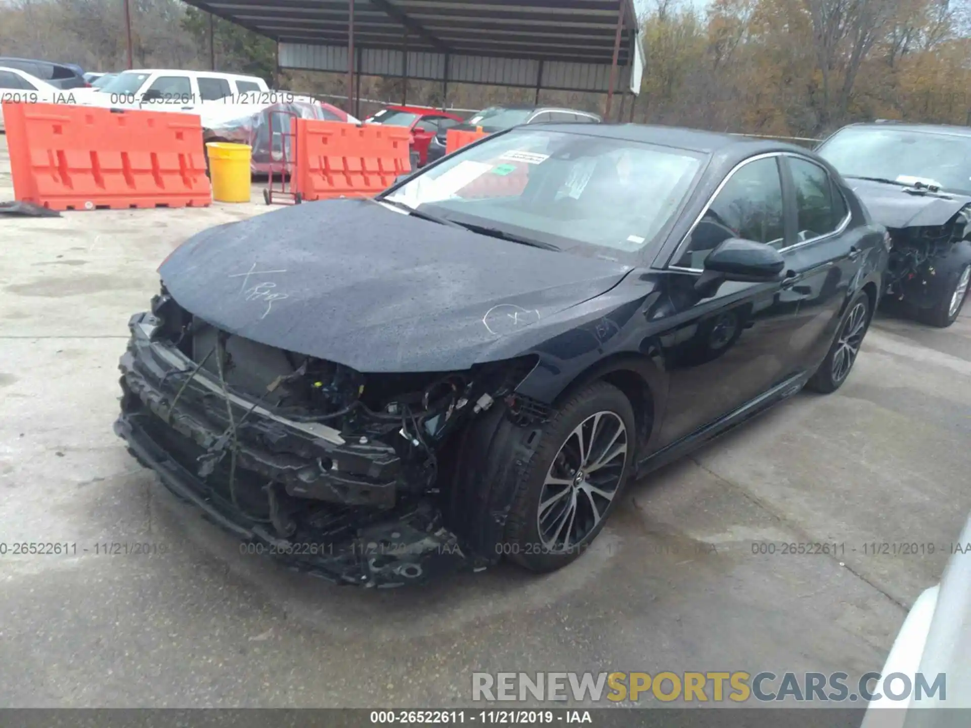 2 Photograph of a damaged car 4T1B11HK1KU738009 TOYOTA CAMRY 2019