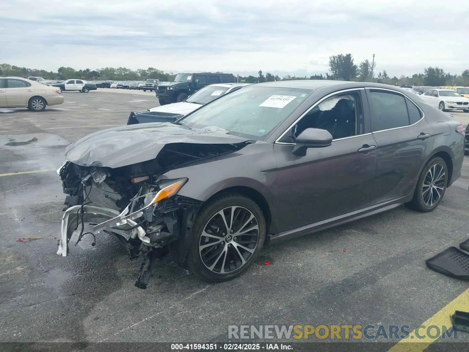 2 Photograph of a damaged car 4T1B11HK1KU739869 TOYOTA CAMRY 2019