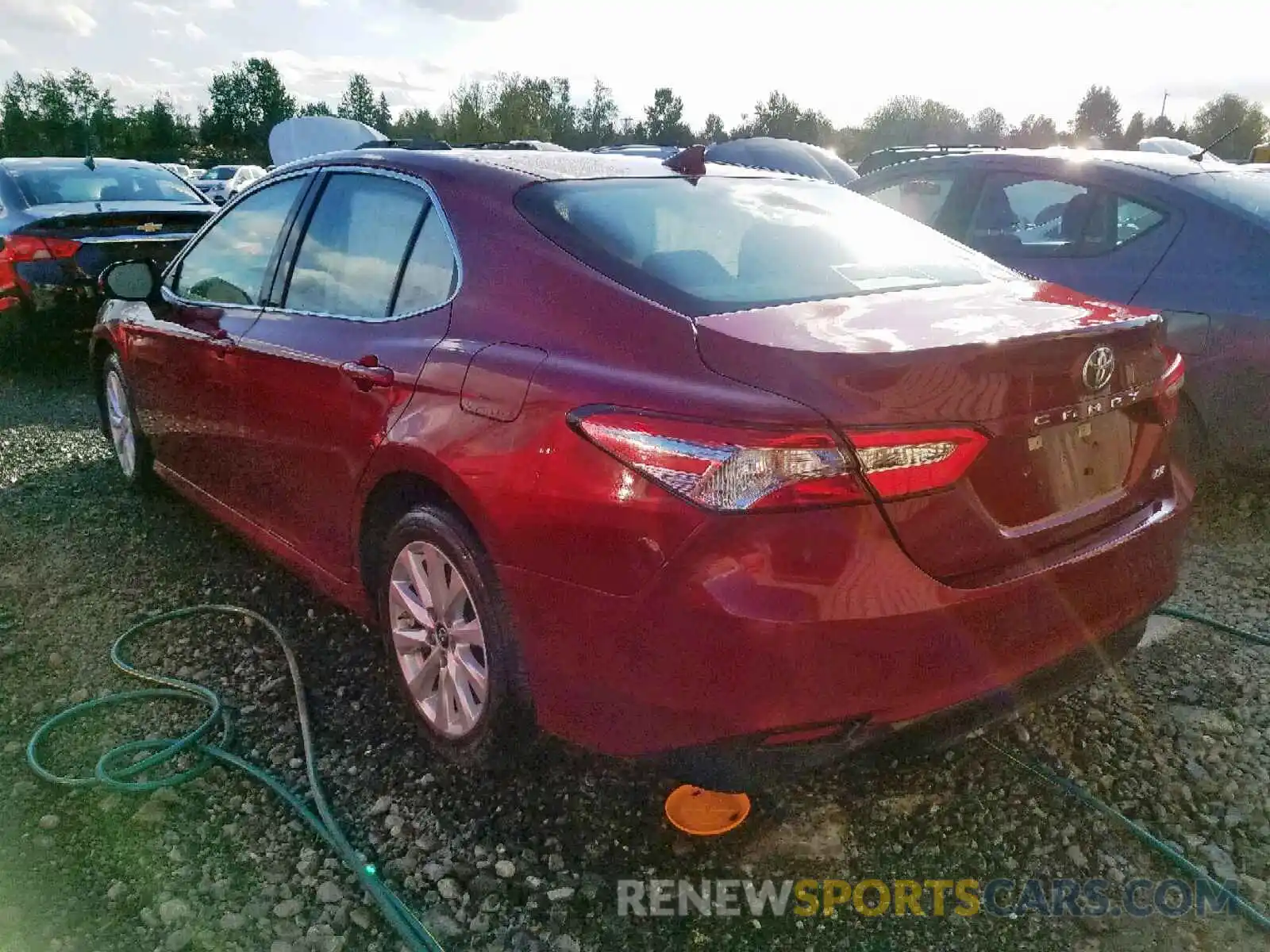 3 Photograph of a damaged car 4T1B11HK1KU742335 TOYOTA CAMRY 2019