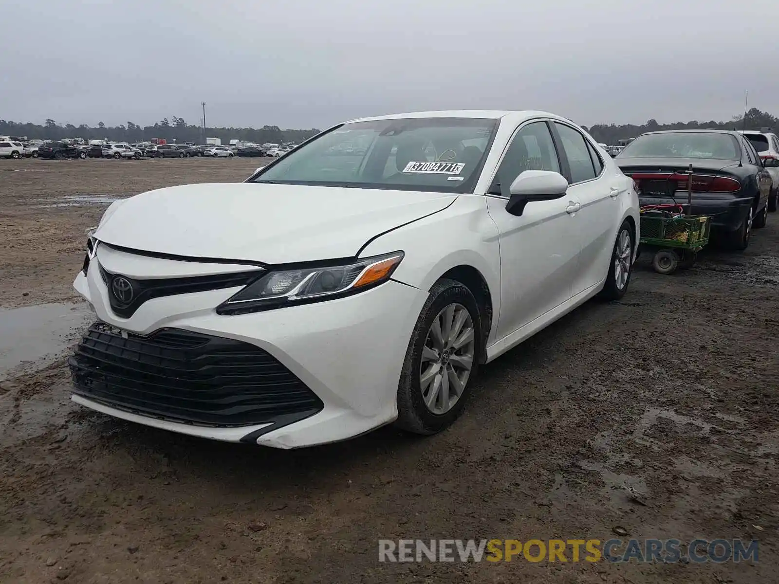 2 Photograph of a damaged car 4T1B11HK1KU742500 TOYOTA CAMRY 2019