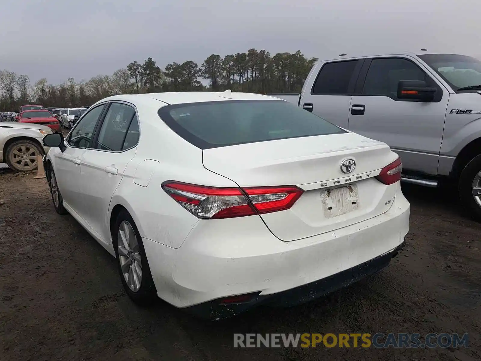 3 Photograph of a damaged car 4T1B11HK1KU742500 TOYOTA CAMRY 2019