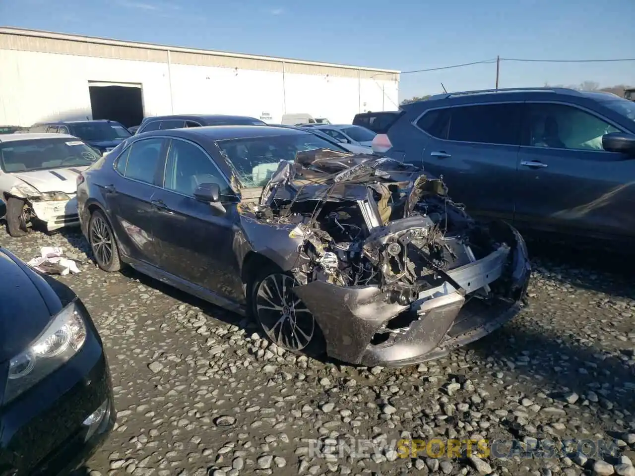 4 Photograph of a damaged car 4T1B11HK1KU743405 TOYOTA CAMRY 2019