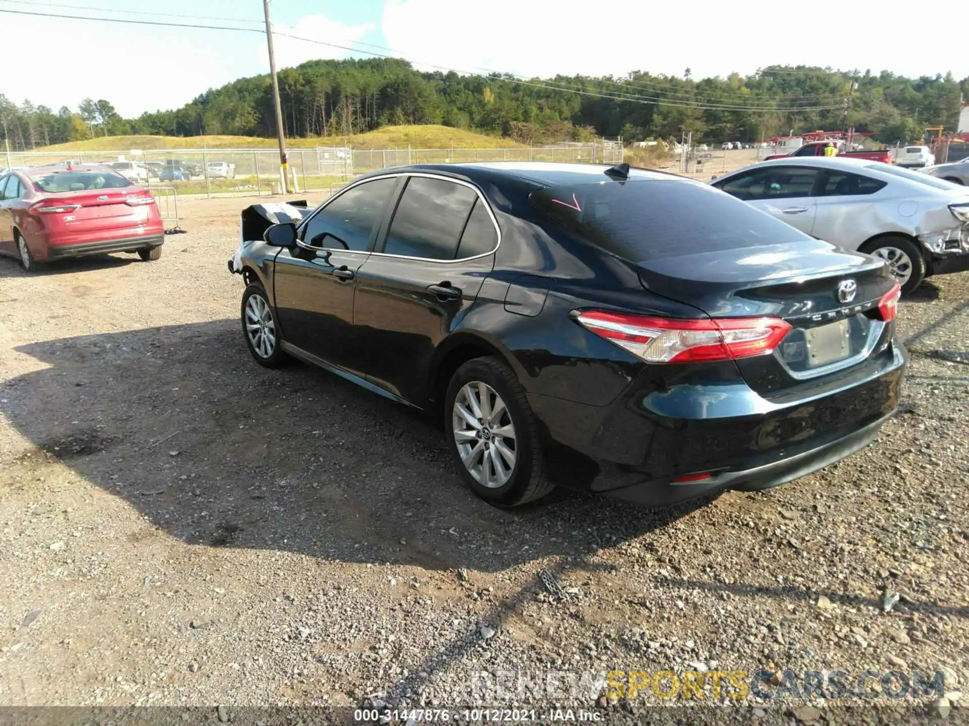 3 Photograph of a damaged car 4T1B11HK1KU746711 TOYOTA CAMRY 2019