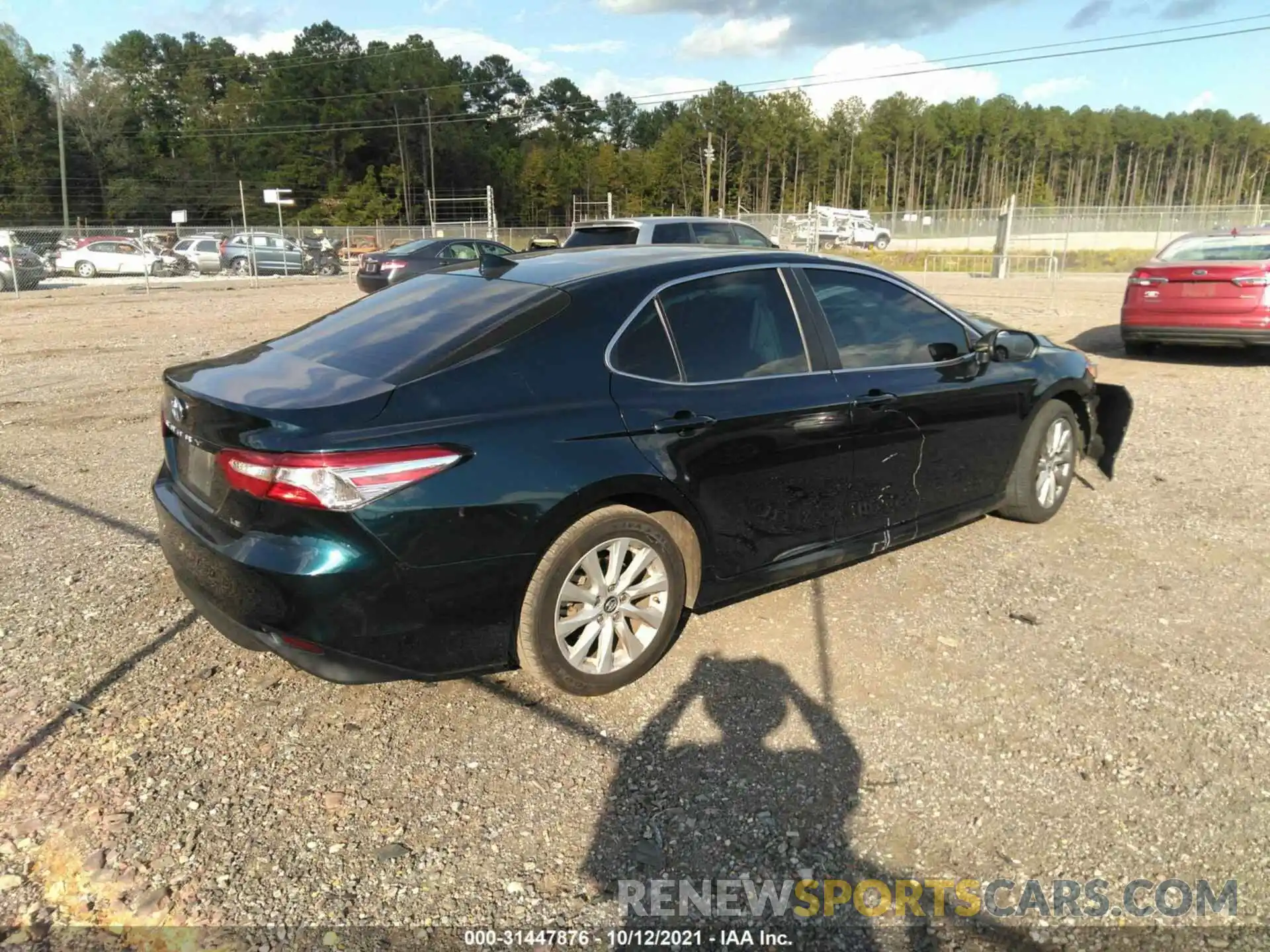 4 Photograph of a damaged car 4T1B11HK1KU746711 TOYOTA CAMRY 2019