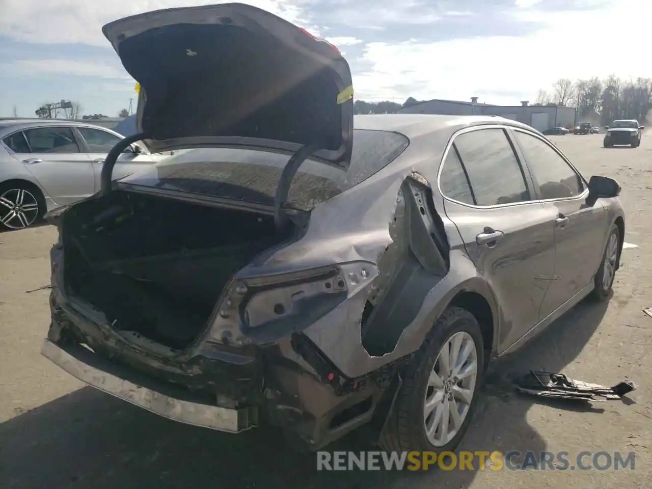 4 Photograph of a damaged car 4T1B11HK1KU750841 TOYOTA CAMRY 2019