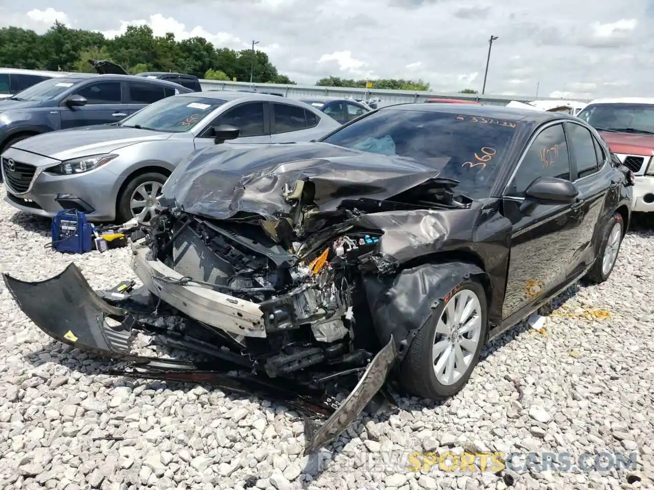 2 Photograph of a damaged car 4T1B11HK1KU752041 TOYOTA CAMRY 2019