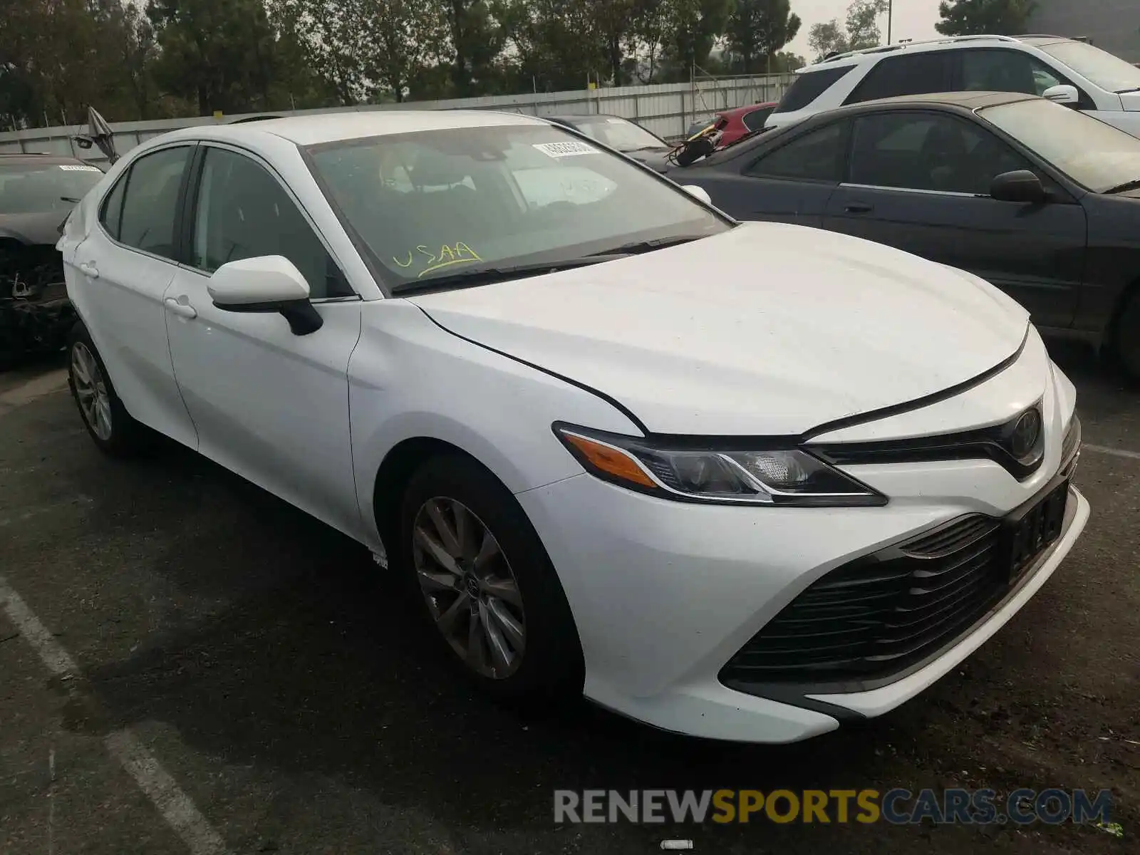 1 Photograph of a damaged car 4T1B11HK1KU756459 TOYOTA CAMRY 2019