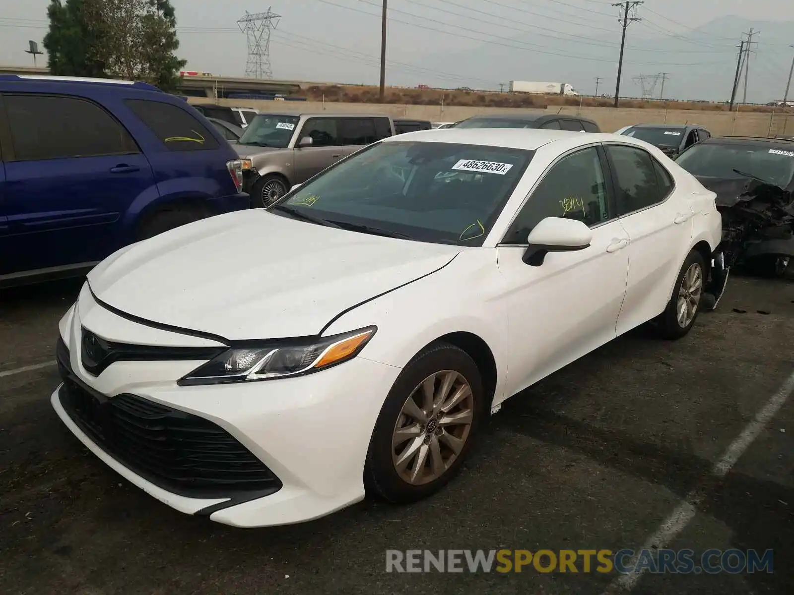 2 Photograph of a damaged car 4T1B11HK1KU756459 TOYOTA CAMRY 2019