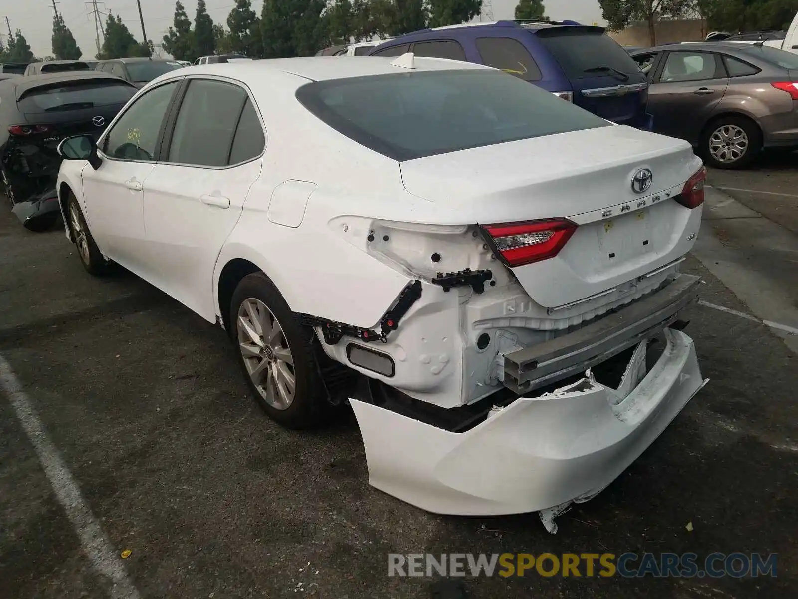 3 Photograph of a damaged car 4T1B11HK1KU756459 TOYOTA CAMRY 2019