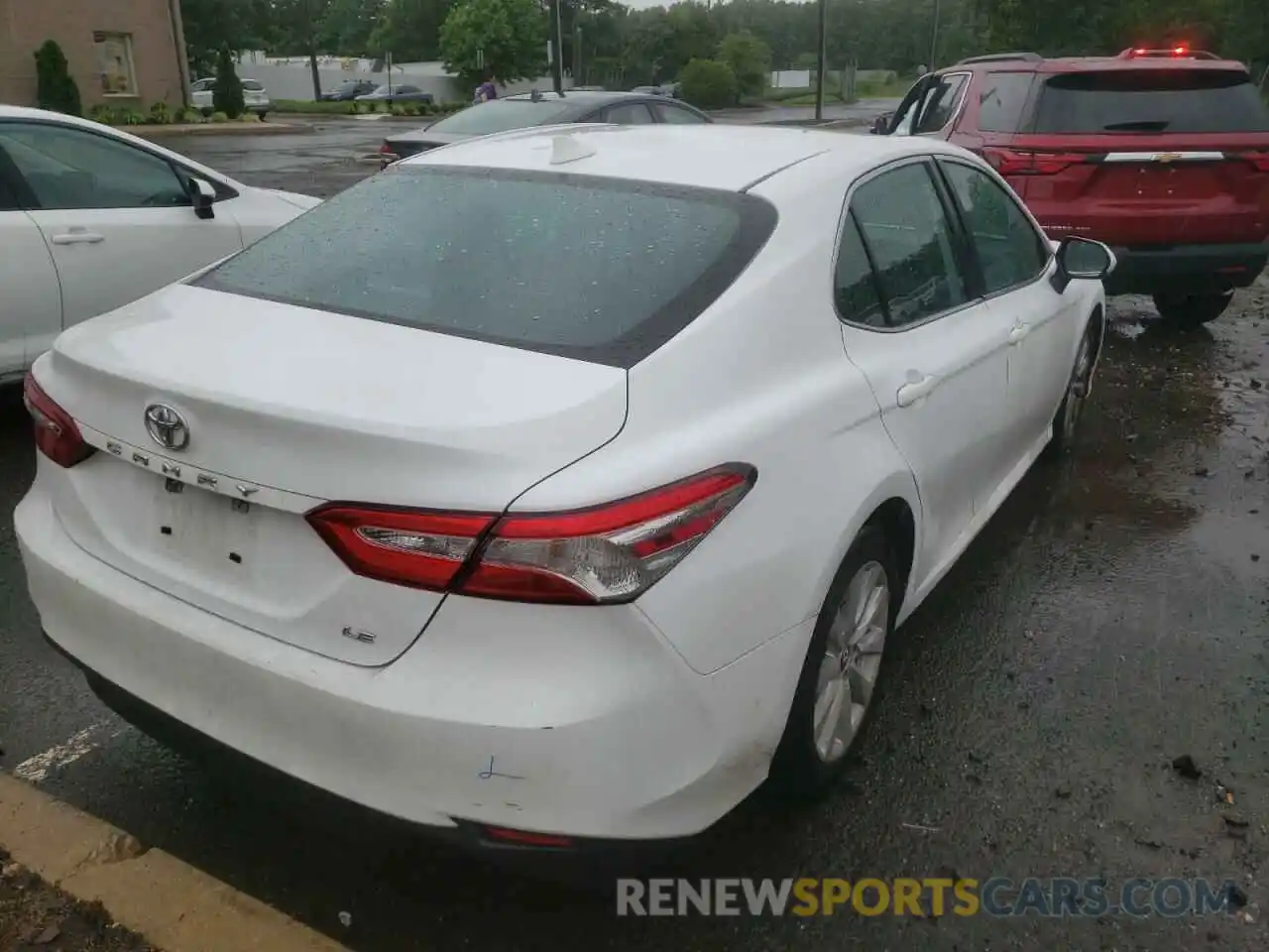 4 Photograph of a damaged car 4T1B11HK1KU757515 TOYOTA CAMRY 2019