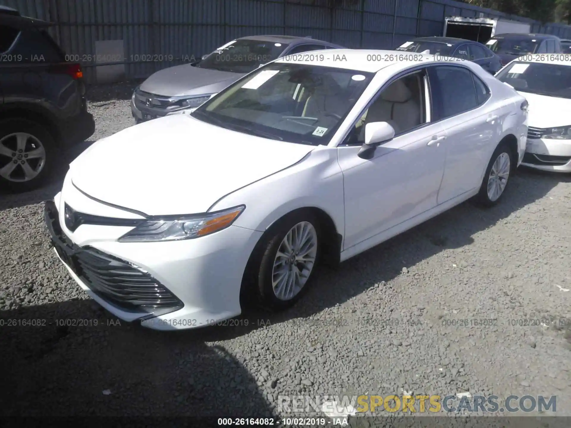 2 Photograph of a damaged car 4T1B11HK1KU760513 TOYOTA CAMRY 2019