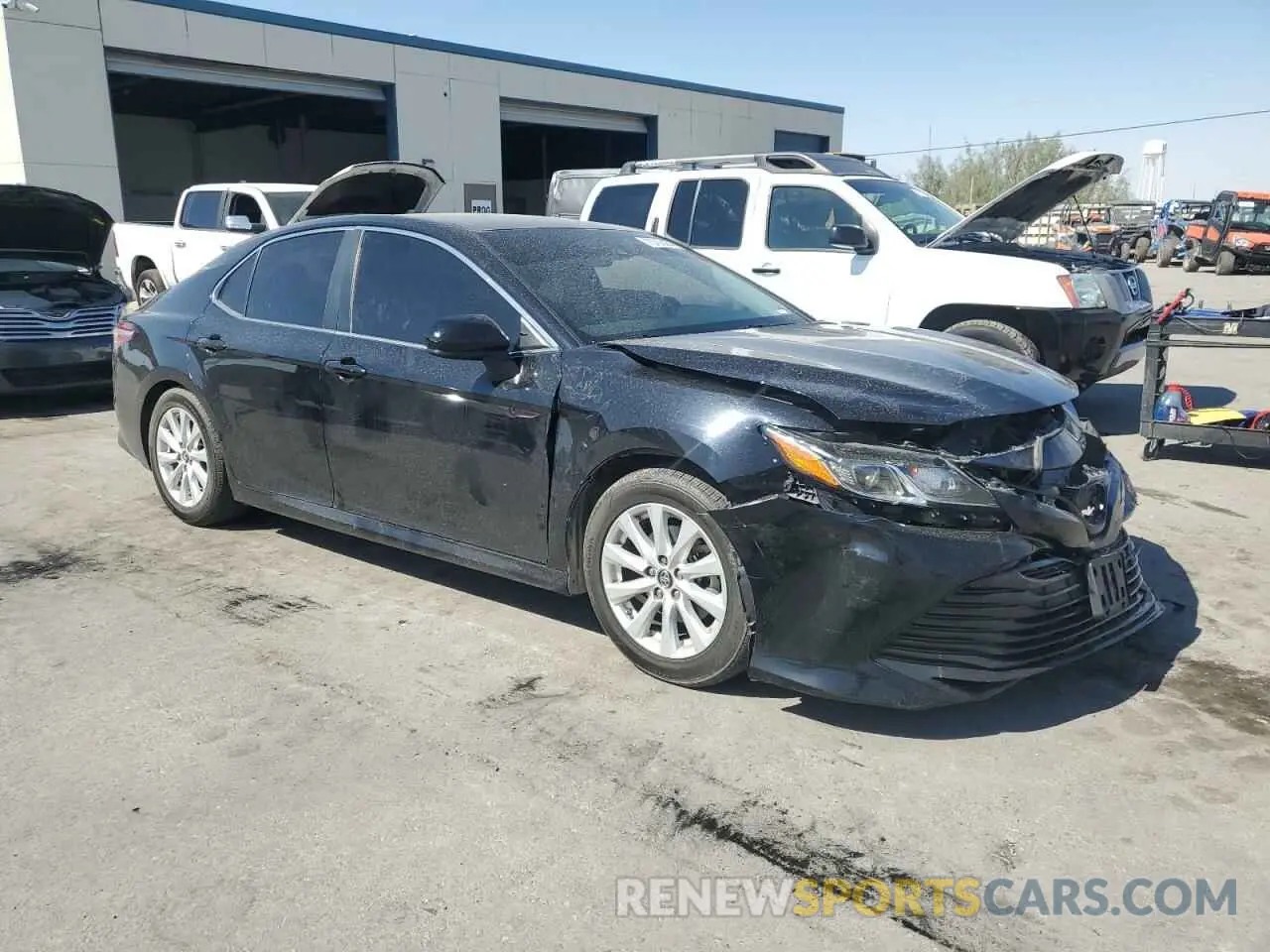 4 Photograph of a damaged car 4T1B11HK1KU765498 TOYOTA CAMRY 2019
