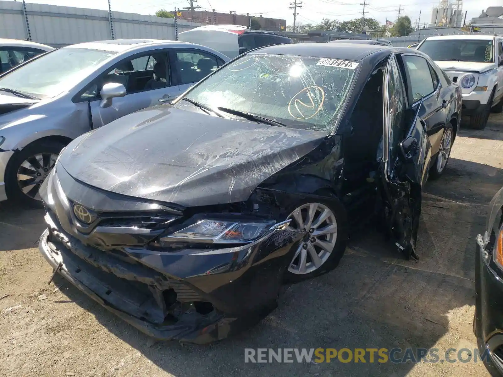 2 Photograph of a damaged car 4T1B11HK1KU765548 TOYOTA CAMRY 2019