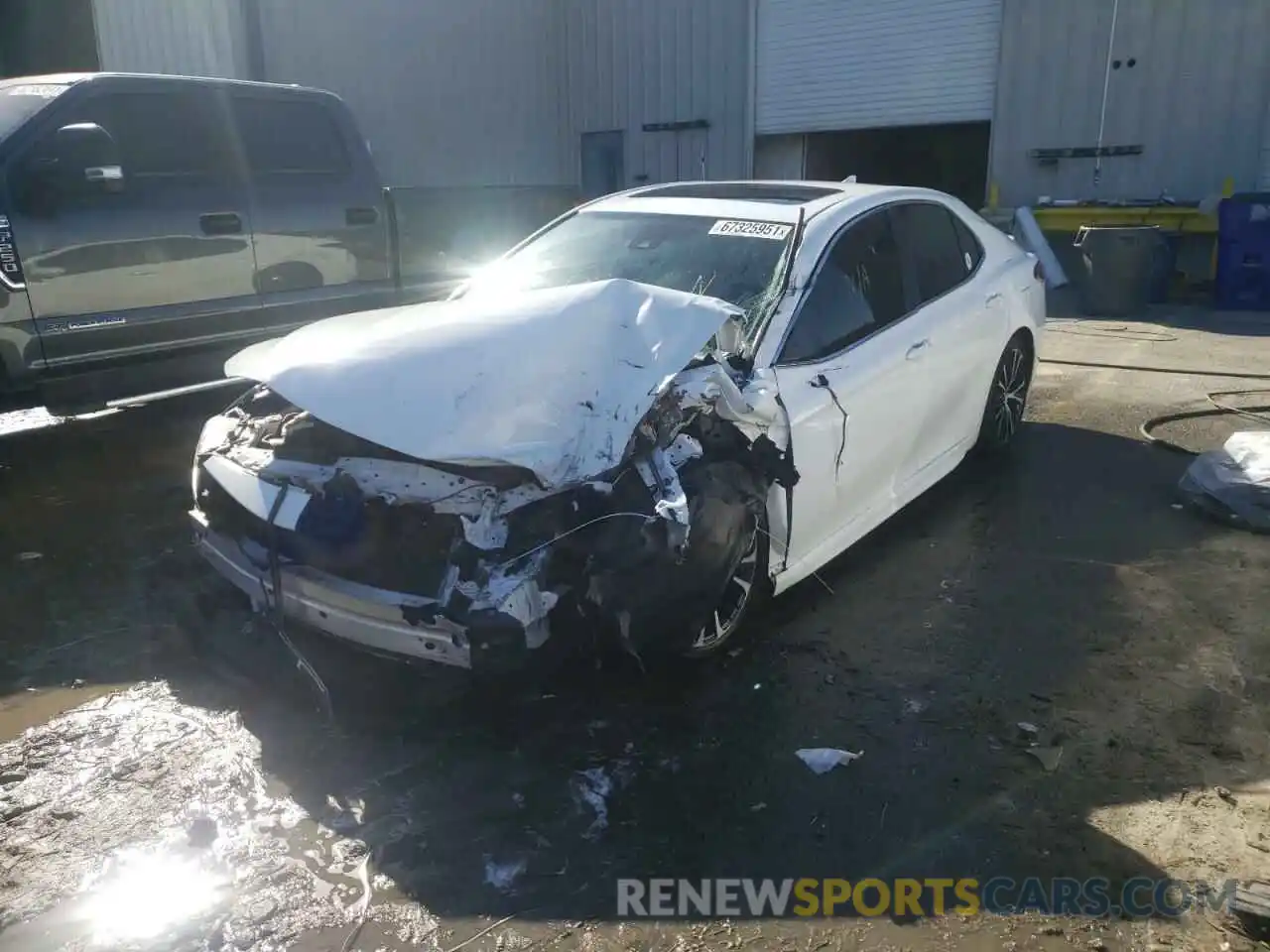 2 Photograph of a damaged car 4T1B11HK1KU767090 TOYOTA CAMRY 2019