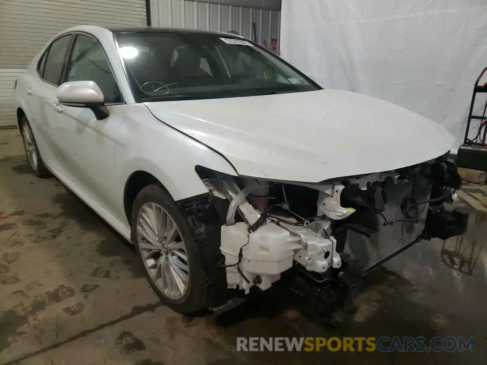 1 Photograph of a damaged car 4T1B11HK1KU767509 TOYOTA CAMRY 2019