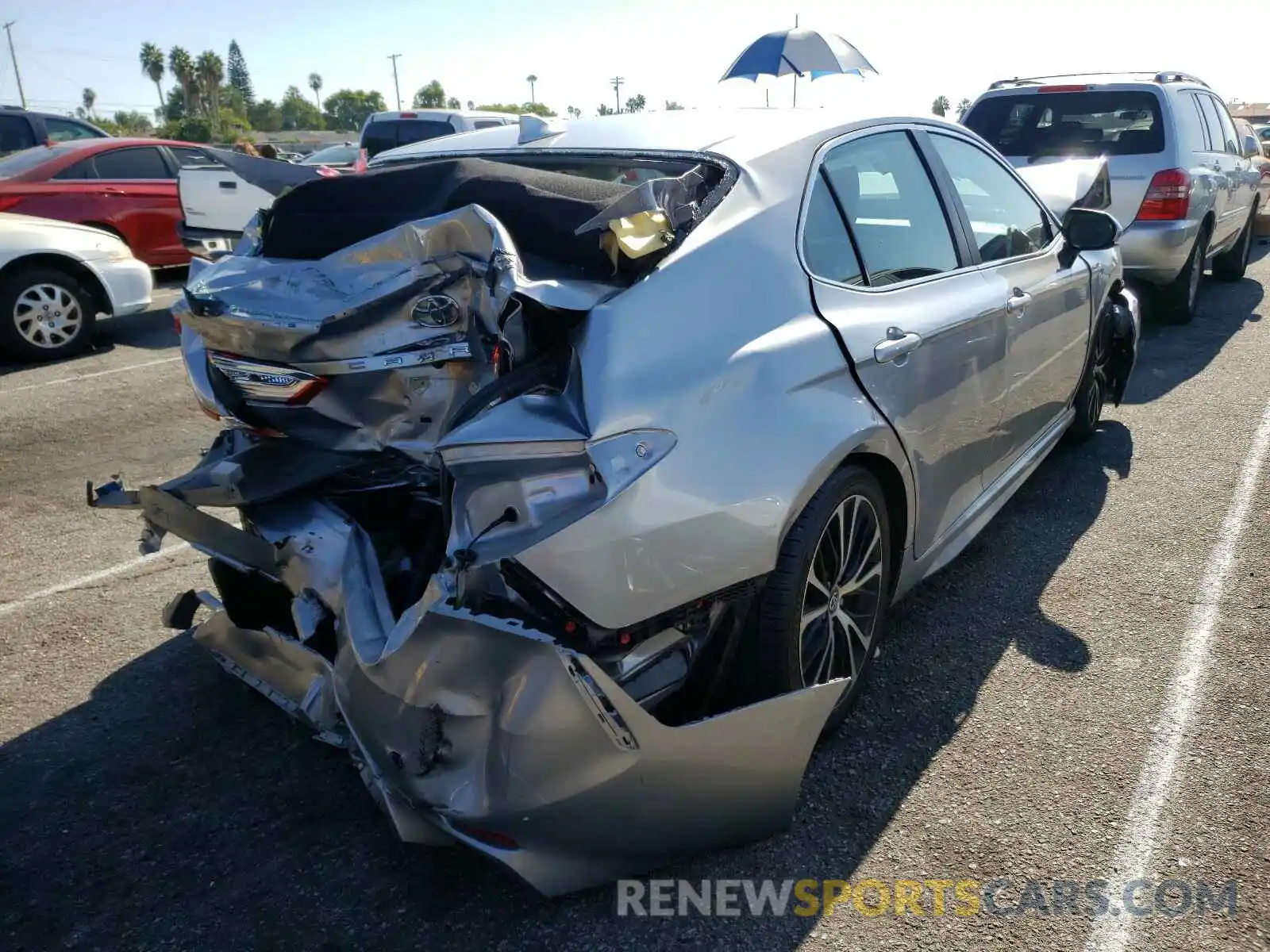 4 Photograph of a damaged car 4T1B11HK1KU773049 TOYOTA CAMRY 2019