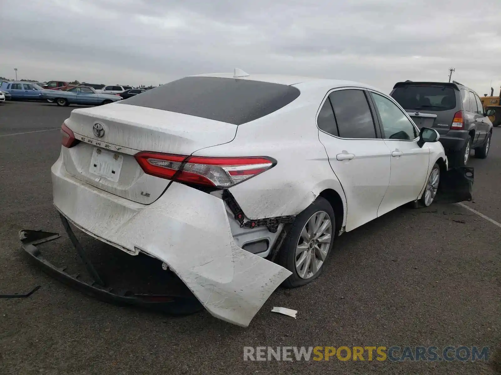 4 Photograph of a damaged car 4T1B11HK1KU773066 TOYOTA CAMRY 2019