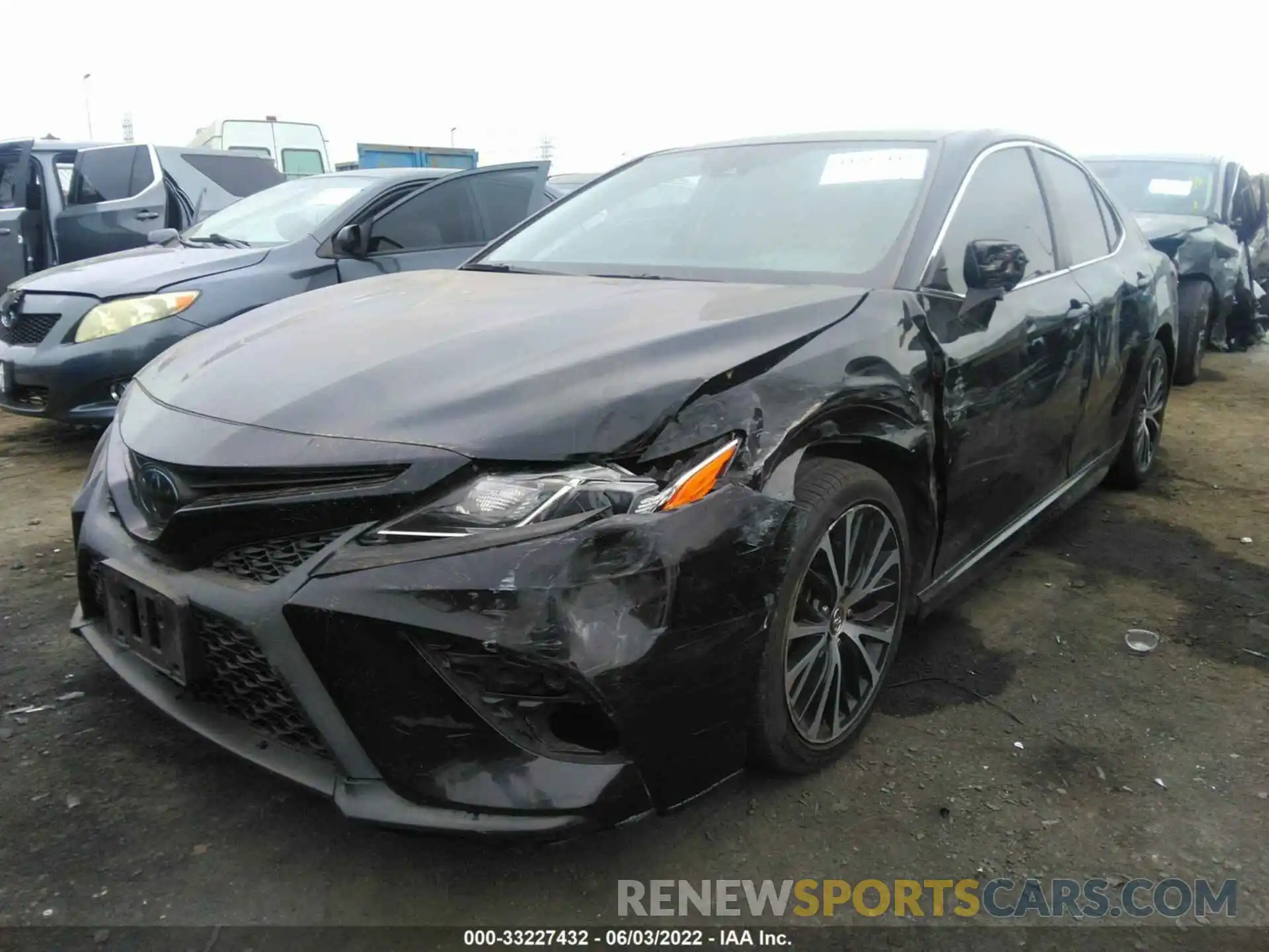 2 Photograph of a damaged car 4T1B11HK1KU774377 TOYOTA CAMRY 2019