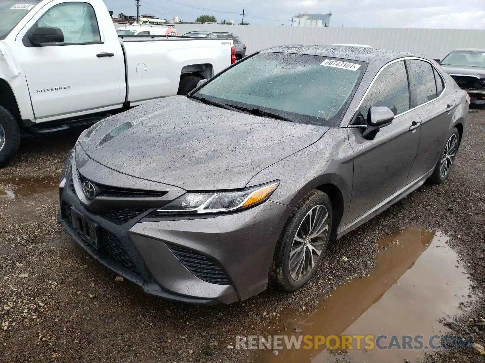 2 Photograph of a damaged car 4T1B11HK1KU779112 TOYOTA CAMRY 2019