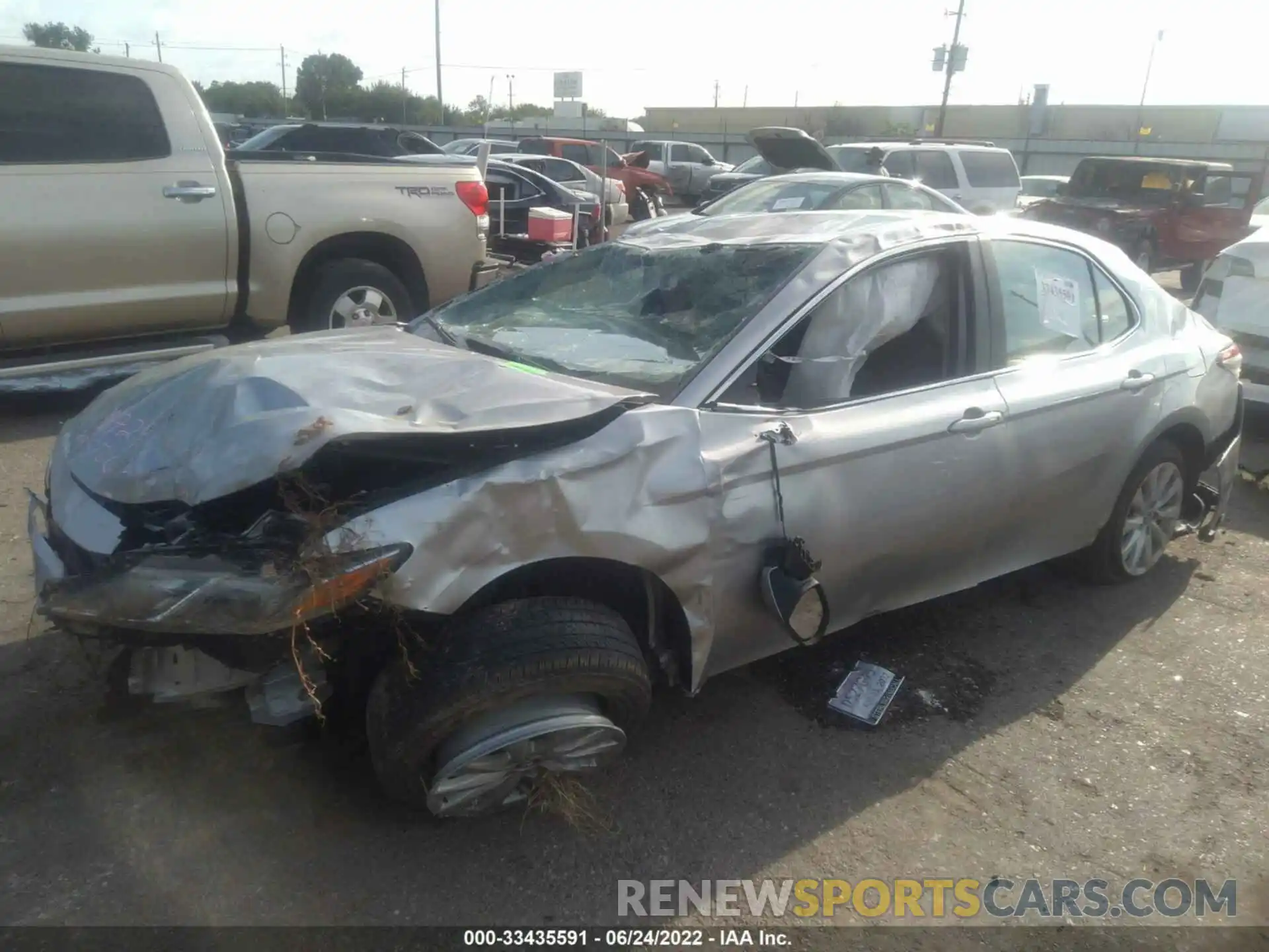 2 Photograph of a damaged car 4T1B11HK1KU783662 TOYOTA CAMRY 2019