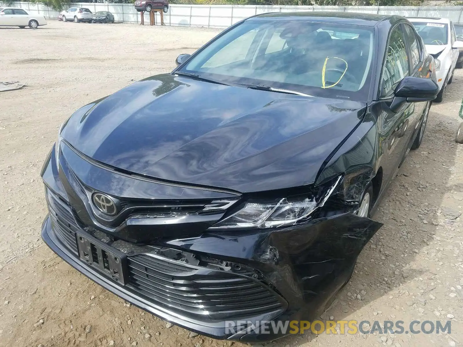 2 Photograph of a damaged car 4T1B11HK1KU789624 TOYOTA CAMRY 2019