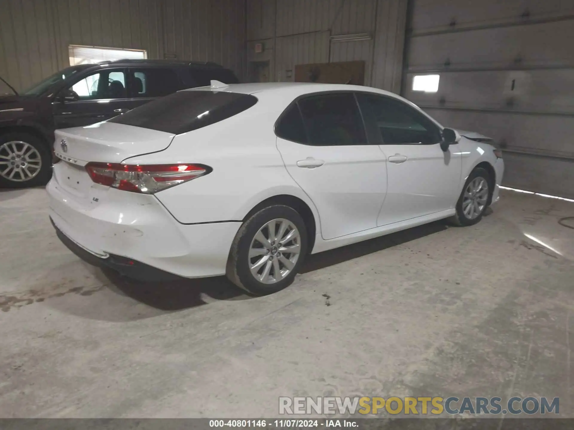4 Photograph of a damaged car 4T1B11HK1KU796072 TOYOTA CAMRY 2019