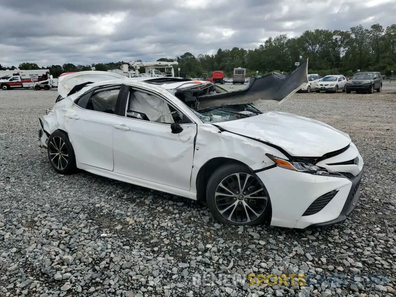 4 Photograph of a damaged car 4T1B11HK1KU796380 TOYOTA CAMRY 2019